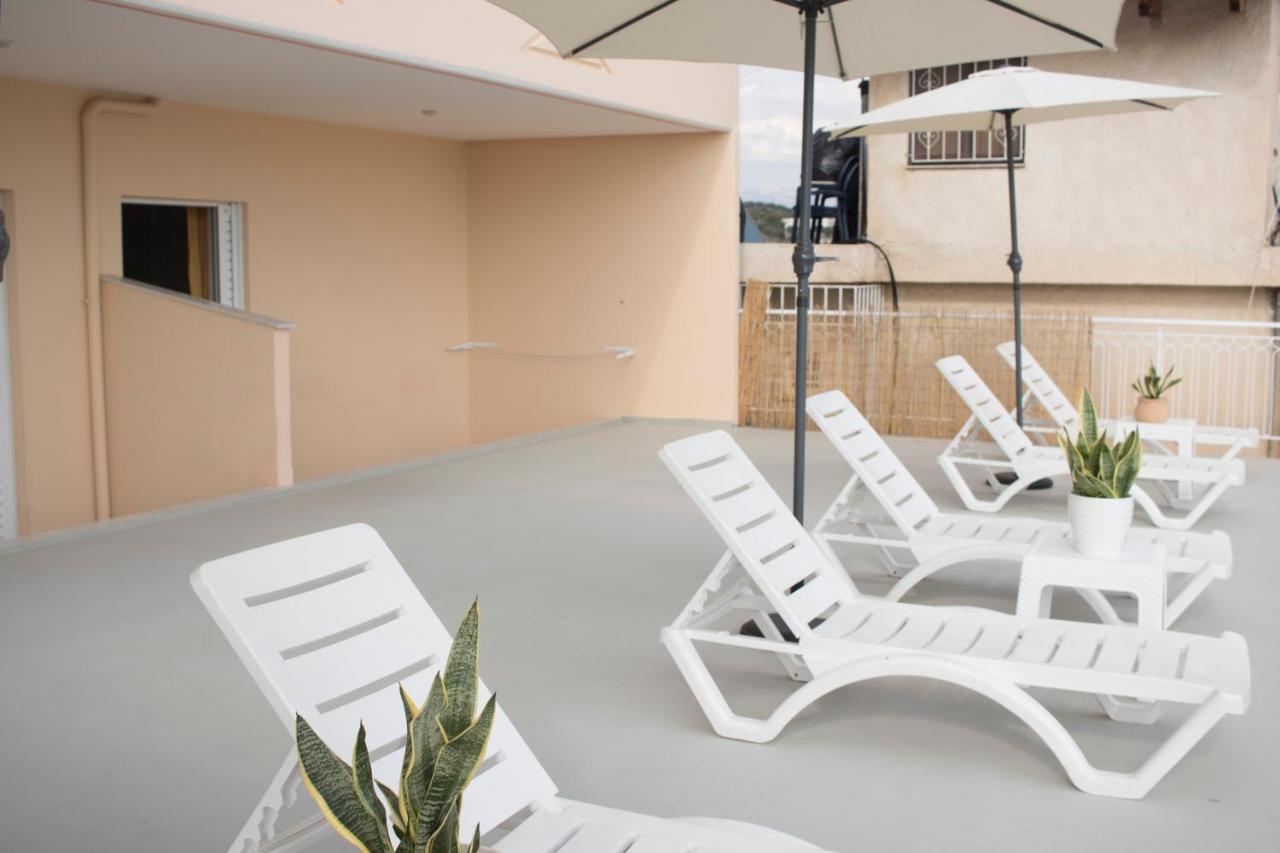 Iliana Apartments Tolón Esterno foto