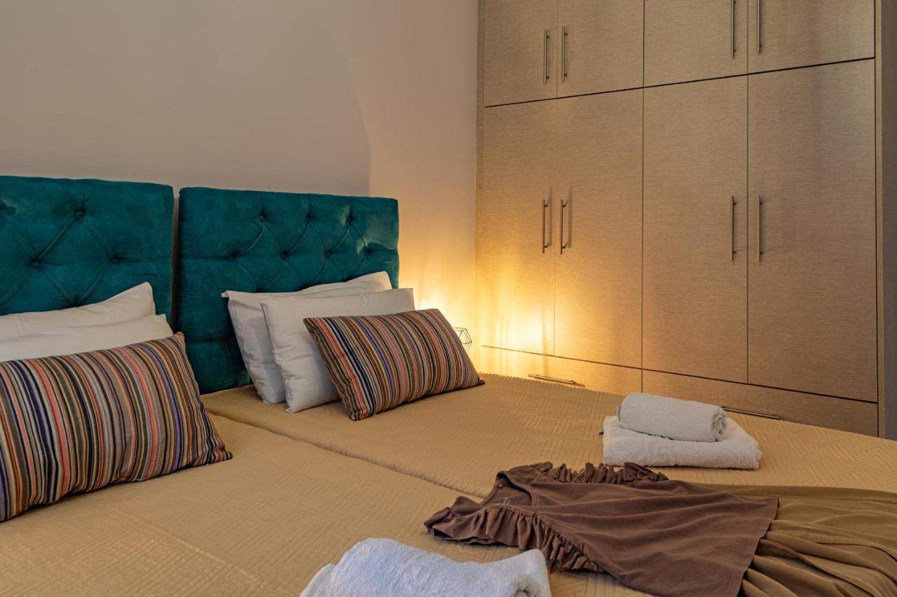 Iliana Apartments Tolón Esterno foto
