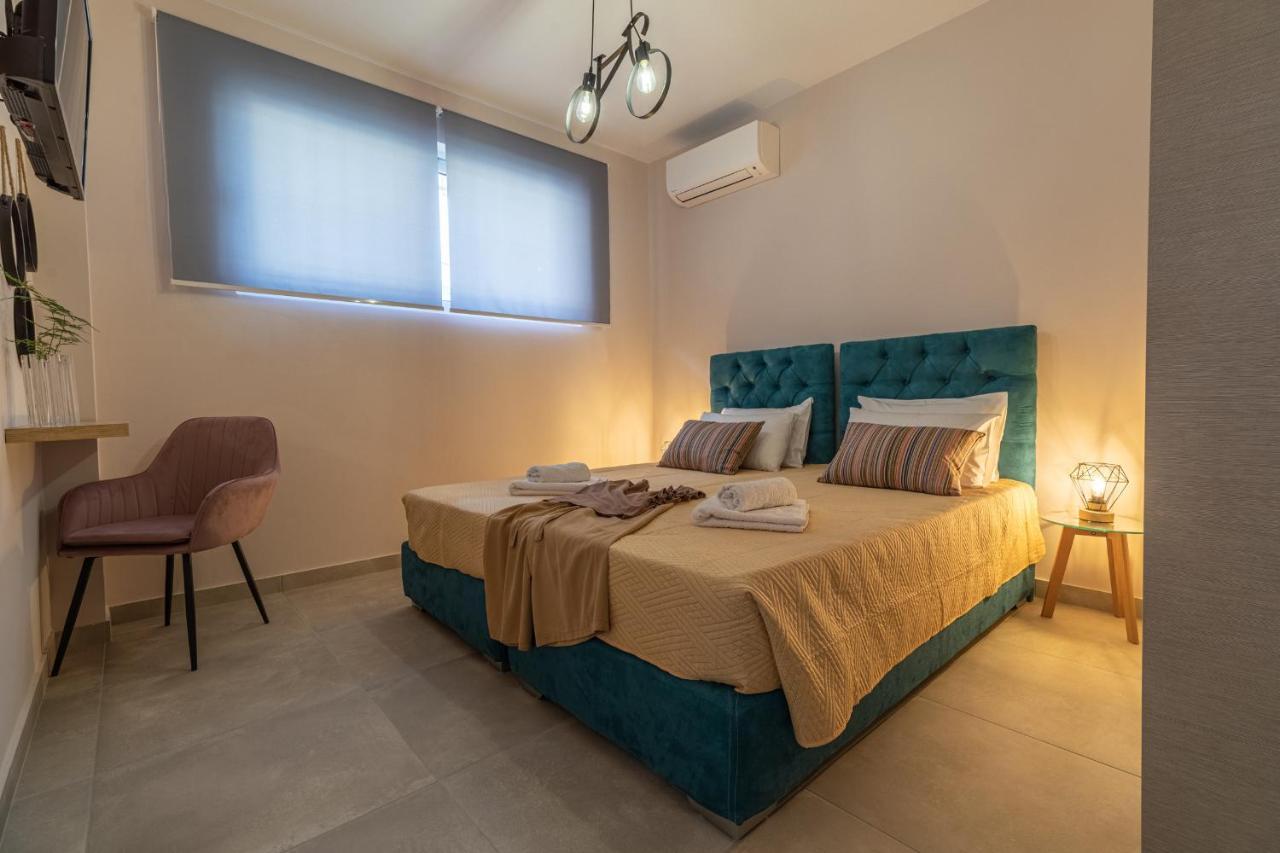Iliana Apartments Tolón Esterno foto
